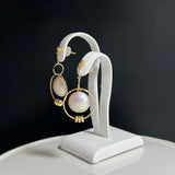 奄美の輝き®×桜珠　マベ真珠 11mm K18イエローゴールドピアス622